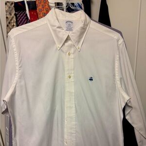 Brooks Brothers White shirt with blue emblem. Large
